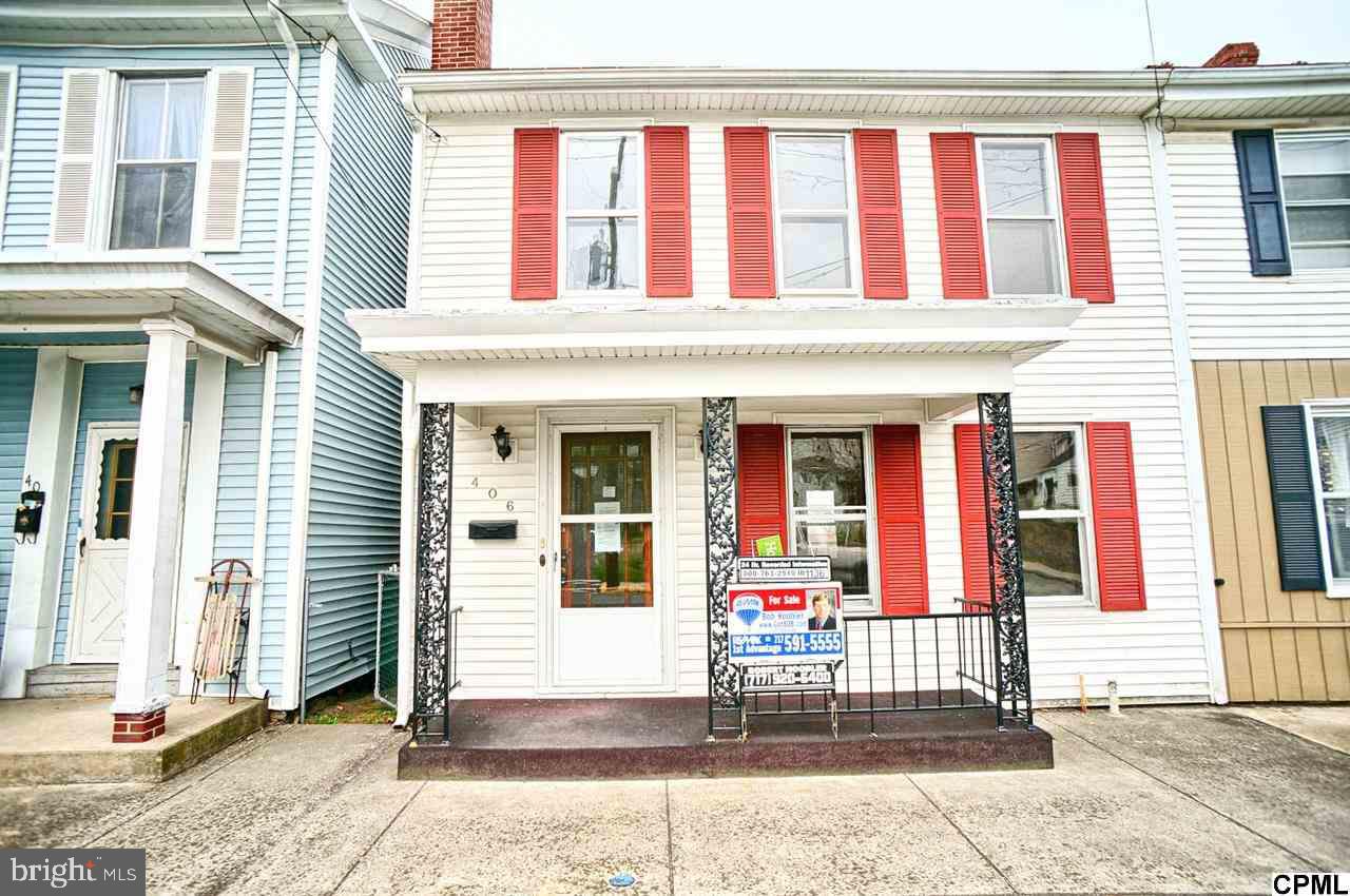 Traditional home with 4 bedrooms and 1.5 baths. Open front porch. Off street parking in rear of property. Hardwood floors throughout most of the home. Show and sell!