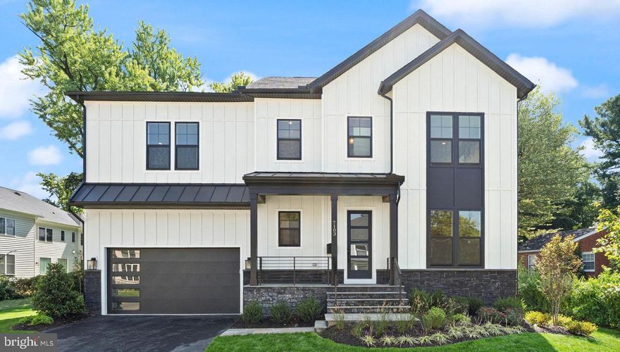 Pre-Construction Opportunity - Expected Completion SUMMER 2026. Evergreene Homes is excited to introduce The Camdyn, a thoughtfully designed home featuring our exclusive Diamond Finishes Package and luxurious details throughout. Ideally situated for daily convenience, this location offers prime commuter access—just minutes from I-66 and I-495, and close to both East and West Falls Church Metro stations, making travel throughout Northern Virginia and into D.C. effortless. Go under contract today to personalize your finishes and select final options! With 10’ ceilings on the main level, a stunning Designer Kitchen, and high-end architectural elements, this home was built to impress. The kitchen features maple cabinetry extending to the ceiling with glass-faced uppers, soft-close drawers and doors, and sleek quartz countertops for a refined, modern aesthetic. A massive center island offers generous seating and storage, making it a true focal point for gathering and entertaining. Designed for both everyday living and memorable occasions, the Great Room includes a modern linear gas fireplace and an entertainment-ready wall that brings warmth and function together beautifully. Upstairs, the Owner’s Suite is a true retreat. Enjoy a spacious bedroom with a boxed ceiling, oversized walk-in closets, and a spa-inspired bath with a frameless glass shower and abundant storage. Three additional bedrooms complete the upper level—one with a private en-suite bath and two sharing a convenient Buddy Bath—each generously sized for comfort.
The main level also includes a large guest suite with a private full bath, ideal for long-term guests or multi-generational living. The upper-level Laundry Room features built-in cabinetry and a utility sink for added convenience. The finished basement expands the living space even further, offering a Rec Room, Media Room, Bedroom, and Full Bath—perfect for entertaining, fitness, or relaxing at home. Our homes always include exceptional quality features, such as a whole-house fan for enhanced air circulation, built-in humidifier, electronic air cleaner, and energy-efficient construction with 2x6 framing, thermal insulation, pest tubes in exterior walls, and a 10-year transferable Builder’s Warranty for peace of mind.
*Floor plans and photos are for informational purposes only; some items depicted may be optional and not included in the listed price.