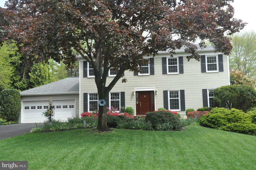 Stonegate colonial on private fenced lot. Home features updated kitchen, large dining room, living room, study, and large addition with stone gas fireplace and windows looking out to professionally landscaped yard, large composite deck and hot tub. 5 good sized bedrooms on 2nd level w/2 full baths.  Finished basement w/work shop and plenty of storage. Two car garage. This home shows like a model.