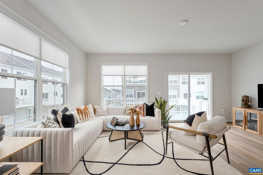 Oct/Nov Move-In ? New Ashton End Townhome at Southwood!  This beautifully designed Ashton end townhome offers 1,894 sq. ft., 4 bedrooms, 3.5 baths, and a 2-car garage.  The open layout features LVP flooring throughout the main living areas and a modern kitchen with a large island, granite countertops, and stainless steel appliances. Enjoy outdoor living on the 8' x 18' rear deck, plus stylish finishes throughout with the Banner Collection interior package.  Visit the decorated model home to explore the community and learn more about available townhomes?schedule your tour today!