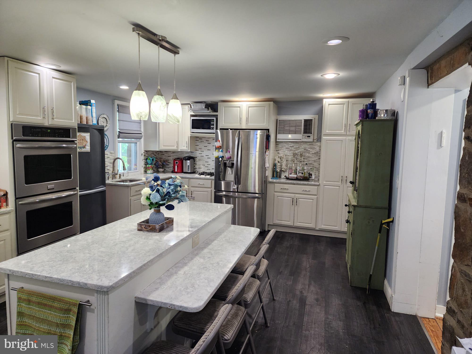 THIS 5 BEDROOM 4 FULL BATHROOM HOME IS CENTRALLY LOCATED AND NESTLED ON A QUIET BLOCK IN CHESWOLDE! FULLY RENOVATED IN 2014/2015; THE MAIN FLOOR FEATURES A LARGE DINING ROOM, LIVING ROOM, BEDROOM ( WHICH CAN ALSO BE USED AS AN OFFICE OR PLAY ROOM), AND A FULL BATHROOM. THE VERY SPACIOUS KITCHEN HIGHLIGHTS INCLUDE ALL DOUBLE STAINLESS STEEL APPLIANCES, QUARTZ COUNTERTOPS, ISLAND, AND SOLID WOOD CABINETS. THE KITCHEN OPENS UP TO BOTH A SCREENED IN PORCH IN THE BACK OF THE HOME AND A PATIO ON THE SIDE OF THE HOME. UPSTAIRS YOU WILL FIND A SUITE WITH IT’S OWN PRIVATE BATHROOM AND WASHER/DRYER. YOU WILL ALSO FIND ANOTHER 2 BEDROOMS AND FULL BATHROOM UPSTAIRS. THE FINISHED BASEMENT HAS AN OPEN AREA ALONG WITH AN ADDITIONAL BEDROOM AND FULL BATHROOM. RECESSED LIGHTING ON THE ENTIRE MAIN FLOOR AND BASEMENT. VINYL WINDOWS THROUGHOUT; REPLACED LESS THAN 8 YEARS AGO. BOTH INSIDE AND OUTSIDE SEWER LINES HAVE BEEN REPLACED IN ADDITION TO THE EXTERNAL WATERLINE. BASEMENT HAS BEEN WATERPROOFED BY ANCHOR WATERPROOFING WITH FRENCH DRAINS. SOLAR PANELS INSTALLED ON THE ROOF WHICH REDUCES BGE BILL SIGNIFICANTLY. NEW ELECTRIC FIREPLACE. UPGRADED ELECTRICAL PANEL. ROOF WAS REPLACED IN 2015. ARCHITECTURAL PLANS HAVE BEEN COMPLETED FOR THIS HOME INCLUDING PERMITS AND A VARIANCE FROM THE CITY FOR A POTENTIAL ADDITION IN THE BACK OF THE HOME. THIS IS ONE YOU WON’T WANT TO MISS!