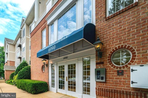 Photo of 6990 Falls Reach Drive #301, FALLS CHURCH, VA 22043 (MLS # VAFX2339458)