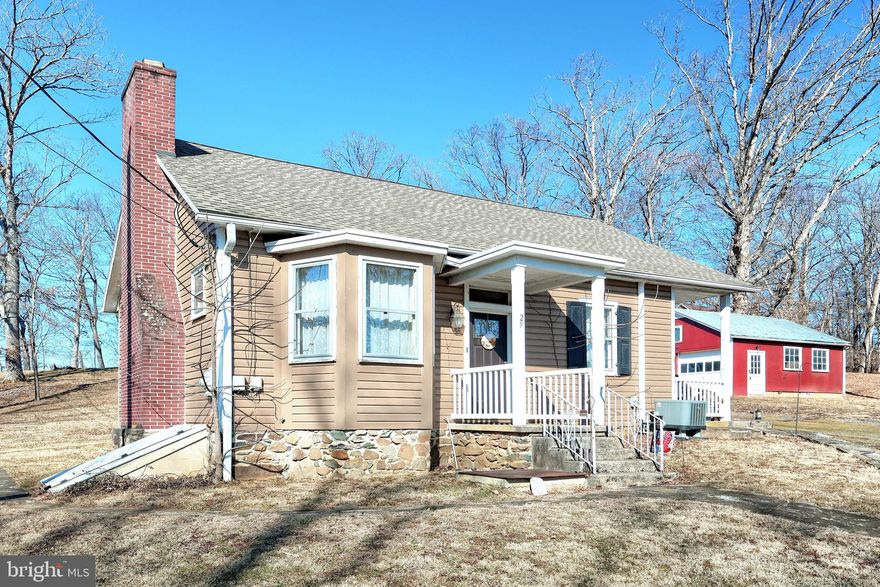 The Glenwood Schoolhouse   What a quaint property awaiting a new owner.  This 2 bedroom, 2 full bath  home features an open floor plan with brick fireplace, updated kitchen with appliances, first floor bedroom and full bath, central air, a private 2nd story suite, and 2 car detached garage.   Home is situated on 1.4 acres in a pretty neck of the woods.  Property is located on the outskirts of Gettysburg borough,  just minutes to the historic battlefield, route 15, and the Maryland line.
