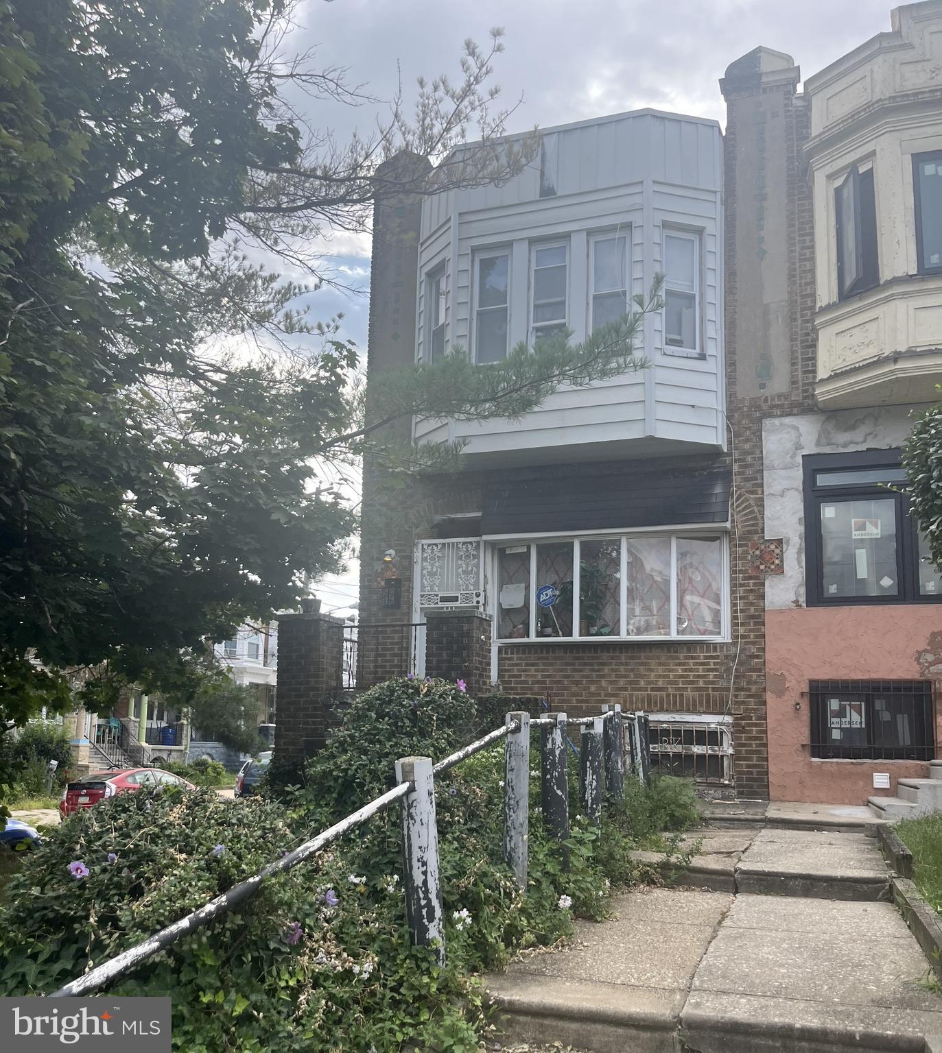 An amazing opportunity to create your dream home.  This corner four-bedroom property, drenched with sunlight, is ready for your creative vision.  Garage parking is accessible through Divinity St in the rear.  Located 1/2 mile to Clark park and an 8-minute drive to Penn. So much possibility here!!