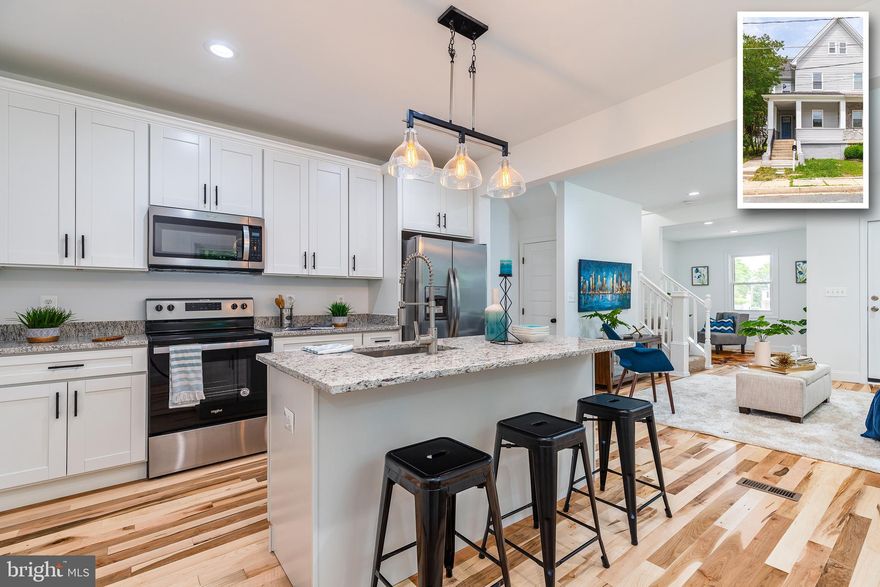 Picture Perfect Renovation on a huge double lot with a detached garage! Two lots are included in sale of this house  for a total of 7,800 SQ FT. Enter into a large open concept living area with beautiful new hardwood flooring that seamlessly flows throughout the entire first level.  Enjoy a completely redesigned kitchen with custom white shaker style cabinetry, granite counter tops, stainless steel appliances, and an island great for entertaining.  Also on the main level off the living area is an additional space which can be used as an office or extra living space, a conveniently located half bathroom, and a mud-room/ laundry area.  On the second level you will find your master suite with your spa-like ensuite bathroom as well as a second bedroom and a second full bathroom.  On the third level enjoy a very spacious third bedroom with high ceilings and walk-in closet.  Enjoy relaxing on your front porch or in your large shaded yard. Parking is a breeze with a two car driveway and detached garage.  No detail has been overlooked in this full-home renovation and all work has been completed by licensed professionals.  Enjoy so many updates such as a new roof, new windows, new siding, updated electric and plumbing, new HVAC and so much more...All you have to do is pack your bags and move right in!  House is vacant and easy to show so schedule your showing today! **Recently appraised for $275,000!**