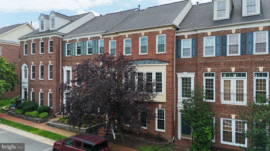 Tucked into one of River Creek’s peaceful streets, this four-level brick front townhome blends timeless design with smart updates and light-filled living spaces that feel instantly welcoming. With approximately 2,779 finished square feet, every inch has been cared for, improved, and designed to enhance everyday comfort.
Step inside and you’ll feel the openness on the main level— sunlight pouring through brand-new 2024 windows  bounces off newly refinished hardwood floors and the whole house painted with a fresh neutral palette. The main level’s open concept gives you an elegant flow from living and dining areas into a beautifully refreshed kitchen featuring a two-year-young sink and microwave, upgraded disposal (2025), and stainless steel appliances including a refrigerator that’s just four years new. The heart of the home opens to a Trex deck (installed 2019) — a low-maintenance outdoor retreat where you can sip coffee, host dinner under the stars, or unwind with leafy community views.
Upstairs, the primary suite feels like a getaway — generous in size with natural light,  a walk-in closet, and spacious bath. The carpet here was replaced just 15 months ago for that soft, new-home feel. Two additional bedrooms and a well-appointed hall bath complete this level, with an upper-level HVAC (NEW 2025!) keeping everything efficient and comfortable.
The fourth level is where the magic continues — a wide-open loft flooded with natural light and offering incredible flexibility. It’s the kind of space that easily transforms with your life: a serene home office, a creative studio, a reading lounge, or a second living area perfect for movie marathons, teen hang out or weekend guests. Framed by the home’s classic dormer windows, it feels both cozy and expansive — a private retreat that invites you to slow down and stretch out.
Downstairs, a spacious open space offers even more versatility — think home gym, play space, or home office — with 2 car garage in the back. The lower-level HVAC  keeps the space cozy year-round, and the newer water heater (2022) ensures hot showers never run out. A newer roof (2019) adds peace of mind, while the Choice Home Warranty, paid through 2028, transfers to the lucky next owner for extra reassurance.
Beyond your front door, River Creek delivers a lifestyle few communities can match. The private, gated neighborhood sits where Goose Creek meets the Potomac — a setting of rolling greens, mature trees, and water views that make every day feel like a getaway. Residents enjoy access to the River Creek Clubhouse, golf course, tennis courts, pool, and walking trails, along with lively neighborhood gatherings and a true sense of place. Just outside the gates, you’ll find favorite Leesburg destinations for shopping, dining, and weekend exploring.
Whether you’re drawn by the natural light, the thoughtful updates, or the rare opportunity to live inside one of Loudoun County’s most picturesque enclaves, this home stands ready to welcome you. Come see why life feels a little more effortless — and a lot more inspiring — on Apache Wells Terrace.