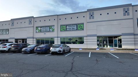 Photo of 44710 Cape Court #116, ASHBURN, VA 20147 (MLS # VALO2110902)