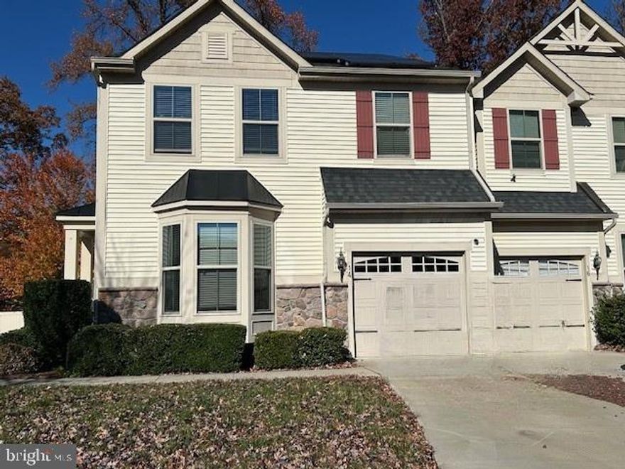 Welcome home to this beautifully maintained twin that lives like a single-family residence. Tucked at the end of a quiet cul-de-sac and backing to mature trees, this home offers a peaceful setting with unbeatable convenience—just minutes to major commuter routes, shopping, dining, and everyday essentials.

Step inside from the welcoming front entry, which opens directly onto the main living level. A bright and spacious kitchen features granite countertops, a center island, and abundant windows that flood the space with natural light. The adjoining dining area easily accommodates a full-size table and leads to a large deck overlooking the fully fenced backyard—ideal for relaxing, grilling, or entertaining. A convenient laundry/mudroom connects to the 1-car garage, and a main-level powder room adds everyday ease. At the front of the home, the generous great room is enhanced by a charming bay window and provides the perfect space for gathering or unwinding. Upstairs, you’ll find three well-sized bedrooms, including a serene primary suite complete with a walk-in closet and private full bath. An additional full hall bathroom serves the remaining bedrooms. The finished lower level expands your living options with a spacious recreation room—perfect for a home office, playroom, media area, or fitness space—plus a large storage room for all your extras. Combining comfort, functionality, and a highly desirable location, this move-in–ready home is the perfect place to settle in for the new year. Don't miss it!