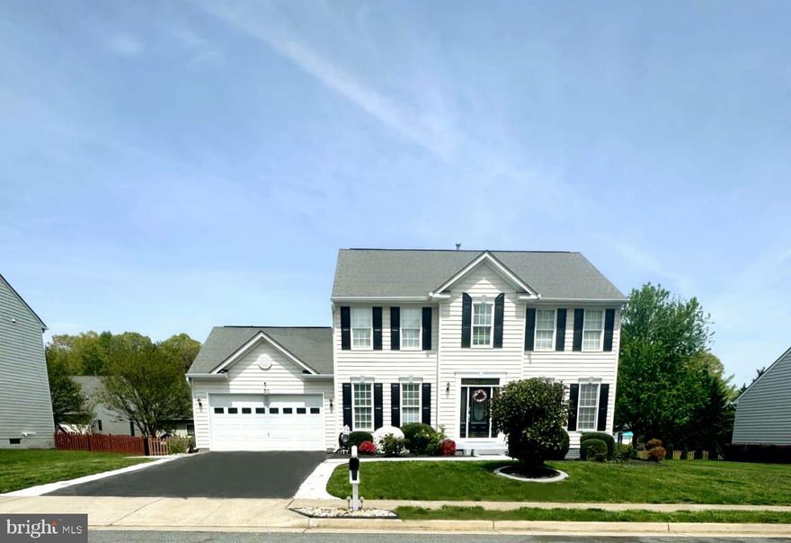 Welcome to your New Home at 6805 Castleton Dr. This five-bedroom, three-and-a-half-bathroom Colonial invites you into a world of elegance, with a beautiful  interior that offers both comfort and style. The traditional Colonial exterior, creates a timeless curb appeal. The dining room mimics these windows, providing a sunny setting for weekend brunches. Formal living room on the main floor or it can be your Home office plus a Family room on the main floor. Step outside the family room to the beautiful patio with cooktop, grill, wet bar, etc. The heart of the home, a gourmet kitchen with granite countertops, stainless steel appliances and the island making it perfect for culinary enthusiasts and entertainers alike Upstairs, Master bedroom, Master bathroom with walking closet, 3 large bedrooms with a common full bathroom. The home's fully finished walkup basement is a true bonus, offering a separate living space complete with a recreation room with wet bar, 5th bedroom, den appropriate for an office, and a full bathroom. This beautiful home is in MOVE-IN Condition and is in a great location - close to schools, shopping, etc. Opportunities like this don't come around often - schedule your appointment today to experience the warmth and charm of this exceptional home!