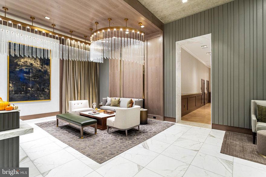 Welcome to the the New Ritz-Carlton Residences of Chevy Chase. This property embodies the same legendary standards of unparalleled service and elegance that guests expect from Ritz-Carlton brand of hotels  globally.  Features include  and open and spacious floor plan, expansive windows and doors, wide plank oak hardwood flooring throughout, recessed lighting, cove lighting and dimmers through out, tray ceilings in both bedrooms, custom closets provide plenty of storage space, primary and secondary baths showcase floor-to-ceiling marble, gourmet kitchen with Italian cabinetry and Thermador appliances. Property has it's own spacious Patio overlooking the center of the new community with an expansive courtyard and a special water feature coming soon. Rental is inclusive of one desirable garage parking spaces and One dedicated storage unit.  Onsite building services and amenities include Doorman and Porter Services, 24/7 Concierge, Full-time On-Site Management and Building Engineer, over 12,000sf Amenity Space with Fitness Studio, Multiple Lounges and Club Rooms, Multiple Outdoor Spaces to include a Veranda and Sky Terrace, Onsite Catering Kitchen and Outdoor Spaces with BBQ Grills, Fire pits, and complimentary wifi throughout the building.  Town Square retail includes Amazon Fresh, pharmacy, restaurants, wine bar, and much more retail soon to come. Easy access to future Purple Line Metro and Capital Cresent Trail.