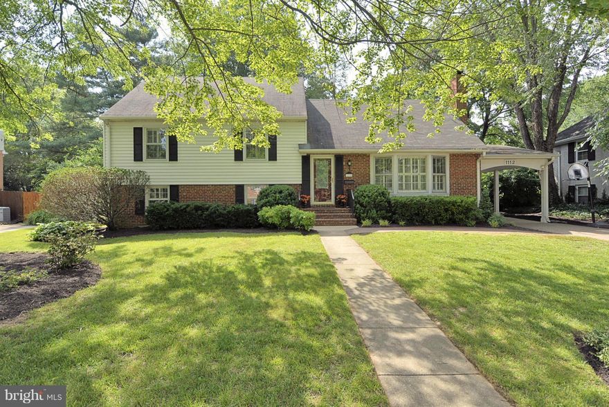 Charming Mayfield model in sought after southern Waynewood location. Open kitchen, dining and family room space makes for a wonderful flow. Granite counters, maple cabinetry and recessed lighting. Renovated bathrooms with ceramic tile and designer touches. Hardwood flooring on main and upper levels (under carpet). Sunroom opens to flat private backyard. Carport too!  Just steps to the pool