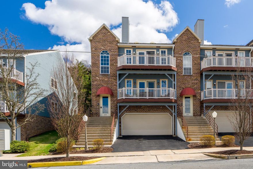 Endless Sunsets as this top floor condo has a great view looking West over Reading.  Nice open floor plan with a vaulted ceiling and 2 skylights. The Living room and Dining room and the hall has new flooring and new paint. This leads out to the wide balcony to enjoy the view. The galley kitchen has gas cooking, a dishwasher, trash compactor and Refrigerator and plenty of cabinet space. The unit has 2 bedrooms and two full baths and a walk-in closet. There is a stackable washer/dryer in the hall closet. The heater and A/C system was replaced in 2022. The Condo fee of $336 includes: The Roof, outside maintenance, cutting the grass, Snow removal. The garage has parking for 2 cars and also a storage room.