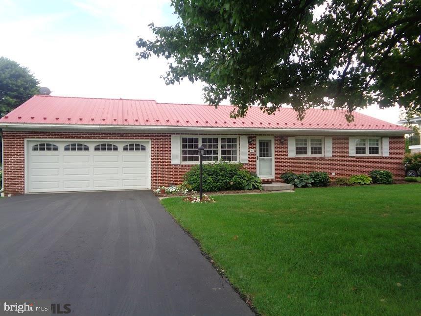 Don't lift a finger at this delightful 2-3 bedroom, 2 bath home. Home is spotless, gleaming hardwood floors, remodeled kitchen, newer interior doors and trim, and sparkling wall of windows in the rear, sunporch. Come and see for yourself.
