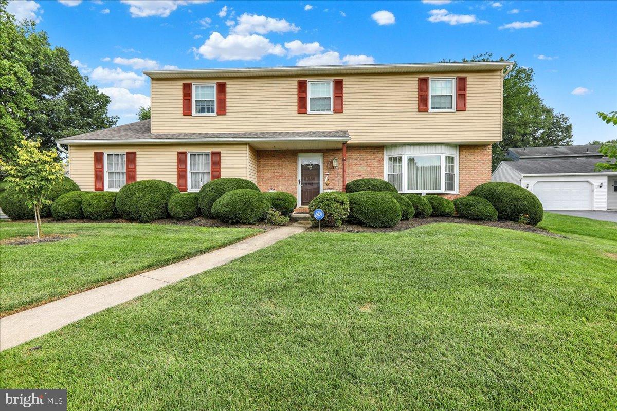 Nestled in the charming Drexelwood neighborhood, this delightful Colonial home offers a perfect blend of comfort and style. With four spacious bedrooms and two and a half bathrooms, there's ample room for relaxation and entertaining. The inviting living area features a cozy wood-burning fireplace, perfect for creating warm memories on chilly evenings. The full basement provides endless possibilities-transform it into a playroom, home gym, or extra storage space. Enjoy the convenience of main-floor laundry and an attached two-car garage, ensuring your daily routines are seamless. Set on a generous 0.21-acre lot, the outdoor space invites you to unwind and enjoy the fresh air. Whether you're hosting summer barbecues or simply enjoying a quiet evening, this home is designed for your lifestyle. With its classic charm and modern conveniences, this residence is more than just a house; it's a place to call home. Don't miss the opportunity to make it yours!