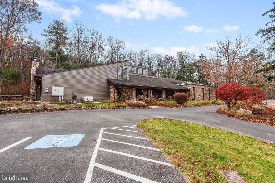 Discover unparalleled opportunity with the Mt. Asbury Retreat Center, a tranquil 117-acre special purpose property nestled at the base of the South Mountain in Newville, Pennsylvania.  This exceptional property is highlighted by a 10,000-square-foot modern conference & retreat center delivered in 2009.  The building includes 14 bedrooms, 17 bathrooms, a vibrant social hall with vaulted ceilings and natural light, a fully-equipped commercial-kitchen, peaceful chapel, spacious conference room with fireplace, and a recreational room.  In addition to the conference center, the property boasts a vintage mountain stone lodge (4 BR / 2.5 BA) with vaulted ceilings, wooden beams, cozy loft, stone fireplace, and a relaxing front porch swing; a newer vinyl-sided Cape Cod dwelling (4 BR / 3.5 BA) with finished basement & 2-car garage; and an intimate 2-bedroom, 1-bathroom carriage house.  Many amenities and outbuildings to include a dedicated maintenance building (28 x 70), pavilion, gazebo, fire pit, koi pond, three wooded walking trails, and a backup generator.  This versatile property enhances your connection with nature allowing for reflection, growth and connection.  Ample road frontage along Centerville Road with four entrances and a private mountain road that winds around the perimeter of the property.  Mt. Asbury is located just 30 miles south of Harrisburg, 12 miles from Carlisle, and only 3 ½ miles from Interstate 81. Also near the picturesque Pine Grove State Park, the expansive Michaux State Forest with exceptional hunting/hiking/mountain biking, and the famous Appalachian Trail. This expansive property presents a unique opportunity for a corporate retreat, conference center, summer camp, religious use, private lodge / club, retirement care center, or just a serene getaway.