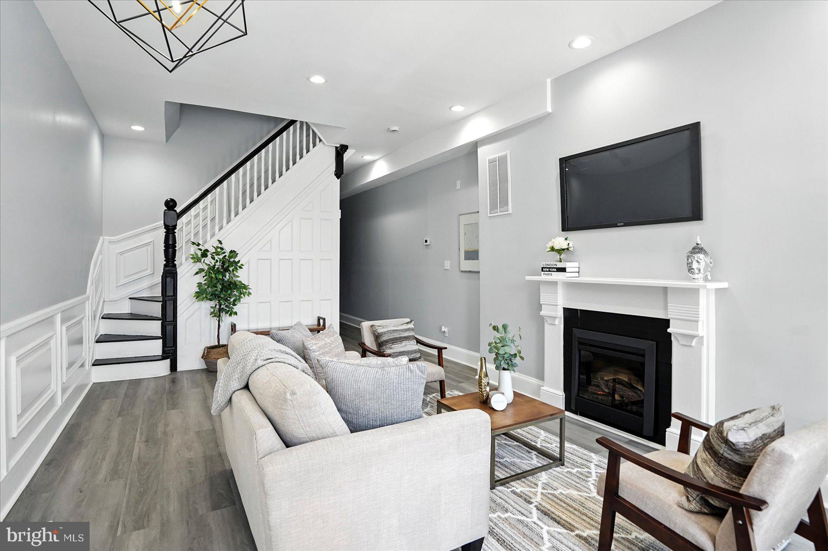 Take your Independence into your own hands. Visit this REMARKABLE HOME TODAY! AFFORDABLE LUXURY at its BEST!!! This beautifully fully renovated 3 story BRICK townhome boasts a perfect blend of historic charm and modern amenities, making it an ideal haven for families, professionals, and anyone seeking a unique lifestyle and living experience. This Urban Oasis has a classic 3 story BRICK facade, complete with original architectural details that include the classic Baltimore-stained glass, full wall inlays, wainscoting throughout and beautiful winding handrails. Your new home will provide the space your family needs to grow and entertain. The interior flaunts high ceilings, oversized windows on every level with classic shutters on the first floor, beautiful LUXUARY Vinyl floors creating a bright and airy atmosphere throughout. When you enter your home the living room provides awesome space to entertain and greet all family and friends. Make your way through the dining room and the kitchen. Allow your inner chef to be free with this magnificent gourmet kitchen fully equipped with NEW Stainless-Steel Appliances, beautiful counters, an Entertainers Bar, and more cabinet and counter space than you likely need, which includes a pantry. Your new home is equipped with 4 SPACIOUS bedrooms, each with ample closet space, including a bonus room on the master suite level that can be used as an office or a CUSTOM CLOSET. Did I mention the Master SUITE has it’s on entire LEVEL!!!! With bathrooms on each level you’ll never run out of space. The bathrooms are tastefully designed with modern fixtures and soothing color schemes. Bring your ideas and turn this remarkable renovation into your place of refuge. The neighborhood offers various amenities, including parks, shopping centers, and community events. Located within walking distance to ALL of Baltimore’s HOTTEST attractions, this property offers easy access to everything Baltimore has to offer like the Inner Harbor, Fells Point, Caton, Patterson Park etc. Steps away from John Hopkins & Kennedy Krieger this investment will continue to pay dividends for years to come. Whether you're looking for a forever home or an investment opportunity, this is an excellent choice. With its desirable location, historic charm, and modern amenities, this property is a cut above the rest. Don't miss the opportunity to make this house your home. Schedule a tour today and experience the unique character of this exceptional property for yourself! BUYERS MAY QUALIFY FOR LENDER SPECIFIC GRANT FUNDS UP TO $$6,000 & FHLB at $$17,500 & LNYW at $$17,000 TOTALING UP TO $$ 40,500. Other Funds may be available to increase these GRANT FUNDS. CALL TODAY TO DISCUSS. WHY RENT WHEN OWNING DOES SO MUCH MORE FOR YOUR FUTURE!!! If your lender or agent isn't telling you about these grants, talk to me and I'll help get you the money you deserve!!