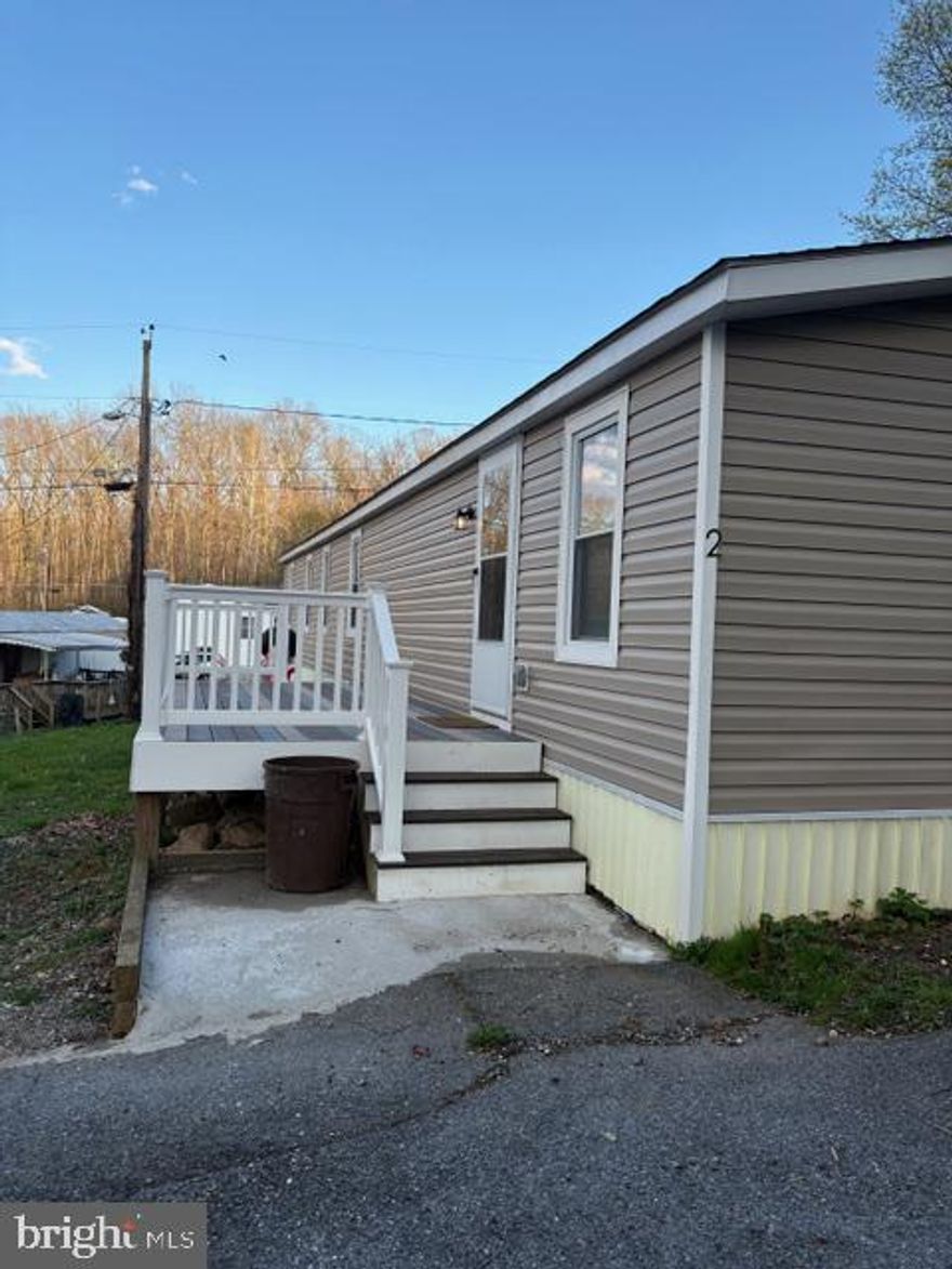 Remodeled and beautiful at an incredible, affordable price! Built in 1986 with 800 sqft of living space in Rockbrook Village Mobile Home Park. Inside features an open floor plan with a big kitchen, plenty of cabinets and counter space, new stainless-steel appliances, a large living room, big primary bedroom with private bathroom. Other features are updated lighting throughout, and separate laundry area washer and dryer. Outside is a custom front porch. The monthly lot fee Includes Trash and Snow Removal.