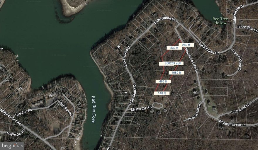 6.89 unrestricted acres in the heart of Deep Creek Lake area, only 1/4 mile away from the lake.   Ready to build your dream home with seclusion and privacy, close to all area parks and amenities.