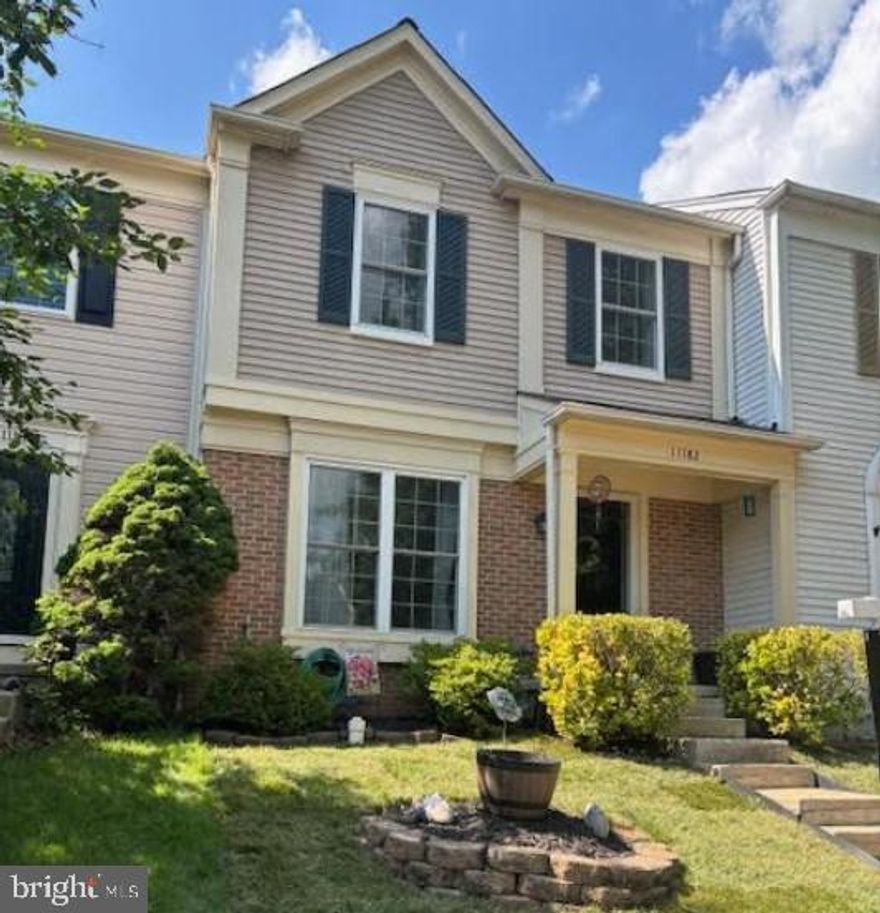 Welcome to 11182 Soldiers Court, an elegant three-level townhouse offering a harmonious blend of timeless style, modern updates, and a highly desirable Manassas location.

This light-filled residence features three generously sized bedrooms, three and a half well-appointed bathrooms, and thoughtfully designed living spaces that cater to both comfort and functionality. Rich hardwood flooring graces both the main level and upper bedrooms, lending warmth and elegance throughout. The thoughtfully updated kitchen features a custom tile backsplash and stylish tiled flooring, opening seamlessly to an elevated deck—perfect for al fresco dining or peaceful morning moments. A well-appointed powder room and a separate dining area enhance the functionality and charm of the main level, creating an ideal setting for both everyday living and refined entertaining.

The upper level hosts a serene primary suite, distinguished by its vaulted ceiling, spacious layout, and spa-inspired en-suite bath, complete with a soaking tub, separate shower, and elegant finishes. Two additional bedrooms, each filled with natural light, and a beautifully maintained hall bath complete the upper level, offering comfort and versatility for family, guests, or home office needs. The walk-out lower level offers updated flooring, a versatile recreation space, and access to a private patio and fully fenced backyard, as well as a dedicated storage room for added convenience.

Additional features include two assigned parking spaces, proximity to the community pool, walkability to Mullen Elementary, and easy access to major commuter routes and shopping destinations.

Combining modern livability with classic appeal, this beautifully maintained home presents a rare opportunity in a sought-after community.