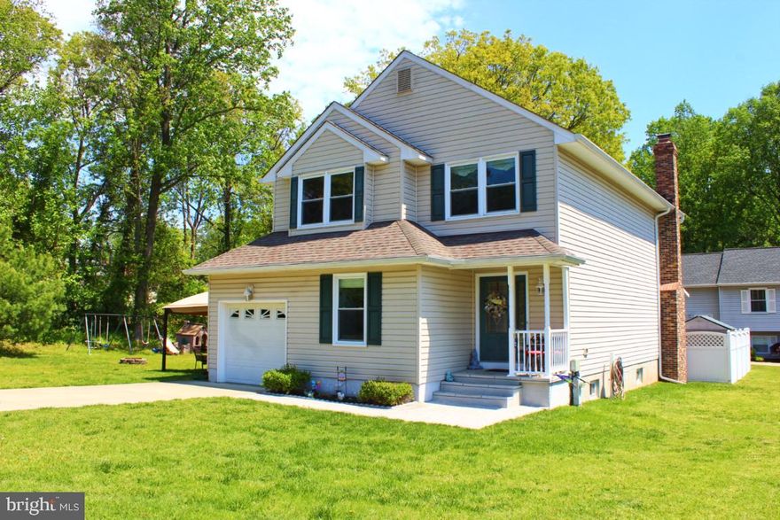4 bedroom 2 1/2 bath colonial in popular Green Haven neighborhood.  Large eat in kitchen, separate dining room and a family room with a beautiful brick fireplace.   With a sunroom off of the family room and a fenced in back yard with pool this home is great for entertaining and family fun.  Upstairs are three bedrooms and a master bedroom with master bath and walk in closet. Downstairs is a partially finished basement for additional living space and unfinished room for storage.  Schedule your showing today.