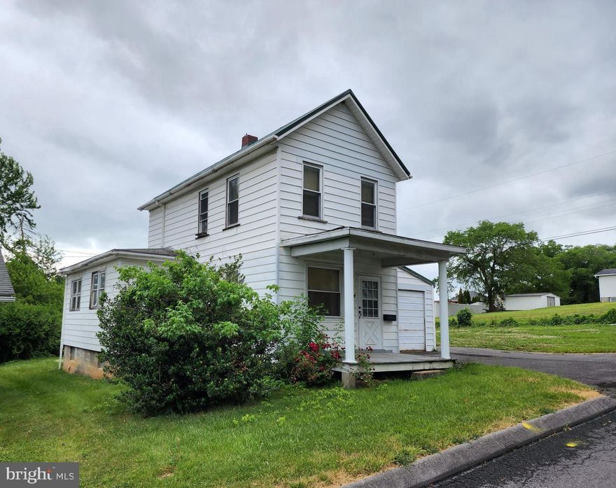 Why rent when you can own your own home?  This 2 bedroom, 2 bath home is situated on a corner lot, basement, gas heat, one car garage, 2 porches and a basement.  Sold "as is" as part of an estate.
