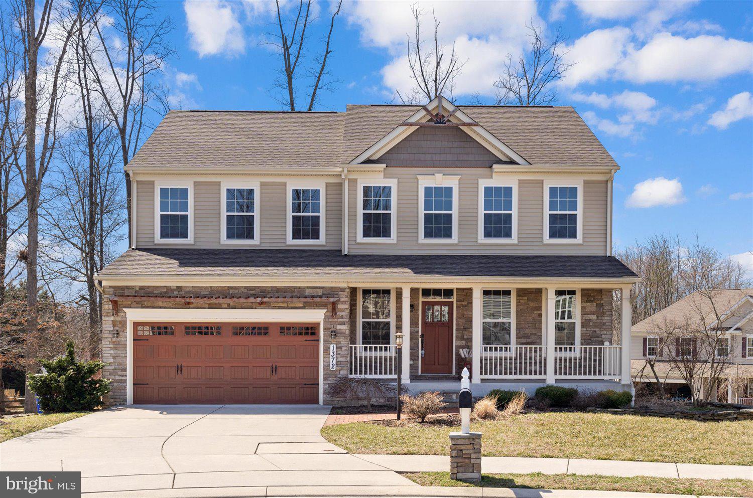 GORGEOUS 4 Bedroom 2.5 Bath BRICK Front Colonial in Bel Air * Features Include: COZY front porch * FABULOUS kitchen with GRANITE countertops, backsplash, island with pendant lights and stainless steel appliances that opens to SUN filled breakfast area/sunroom * SPACIOUS family room with floor to ceiling STONE front GAS fireplace * Powder room * GLEAMING hardwood floors * DEN with FRENCH doors * On the SECOND level you will find a LARGE primary suite with a TRAY ceiling and WALK-in closet * three additional bedrooms, FULL bath and LAUNDRY room * An extensive Recreation room with PLENTY of storage completes the LOWER level * LARGE professionally landscaped yard with Japanese footbridge and integrated dry creek riverbed * Seller has strategically planted beautiful flowers throughout the property that will be coming into bloom soon that will accentuate this gorgeous yard * TWO car garage with MULTIPLE car driveway * SMALL private cul de sac * Close to Main Street, shopping, and Annie's Playground * A MUST SEE hidden gem in the highly sought after MARYWOOD section in Bel Air!!