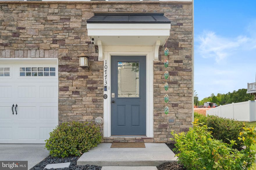 Beautifully maintained three-level end-unit townhome, built in 2016,
offering an exceptional blend of privacy, space, and thoughtful
upgrades throughout. This residence features 4 bedrooms, 2 full baths,
and 2 half baths, along with a 1-car garage, and is ideally located
adjacent to Bennett Elementary School in a highly regarded school
district.
Inside, you’ll find high-end finishes at every turn, including
hand-scraped hardwood flooring on the main level and hallways,
hardwood in the primary suite, luxury vinyl in the finished basement
recreation room, and upgraded tile in all bathrooms, with no carpet
throughout. Additional interior highlights include recessed lighting
and a stylish stone accent wall, adding warmth and character to the
home.
The gourmet kitchen is a true centerpiece, showcasing a large center
island, granite countertops, stainless steel appliances, upgraded
cabinetry, and a spacious pantry, enhanced by matching 2024 Samsung
Smart kitchen appliances. A 2024 Samsung Smart washer and dryer add
modern convenience.
The primary suite serves as a private retreat, featuring a walk-in
closet and a spa-inspired bath complete with a soaking tub, double
vanity, and a separate shower with built-in seating. The upper level
is completed by two additional bedrooms and convenient bedroom-level
laundry.
Enjoy abundant natural light throughout, along with exceptional
outdoor living spaces including a composite deck with an electric
retractable awning and a paver patio off the walkout lower level. The
home is equipped with a Ring doorbell, security sensors, and Waze
camera system for added peace of mind. A Carrier HVAC system (2021)
has been recently inspected and serviced in 2026, along with an
inspection on the hot water heater, with the reports available in the
MLS documents.
The kid-friendly community offers outstanding amenities, including a
splash park, several playgrounds, walking trails, and a community
fishing pond, all just minutes from PW County Parkway, VRE, shopping,
and dining.