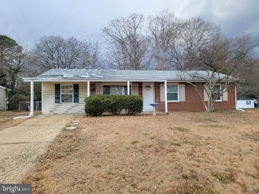 Central location for this one level home!  Close to shopping, dining, work and metro area yet also a neighborhood feel with a nearby school/recreation area.  Plenty of living space with the 4 bedrooms and long dining and kitchen space ready for gatherings. Kitchen has freshly painted cabinets and gas stove and a large pantry and laundry closet. The living room also has the wood laminate flooring and no worries arranging your sectional furniture as there is ample room.  Fully fenced backyard and slider into the house makes it easy for outdoor fun.  A patio, burn pit and mature trees work as a start for your backyard dream plans.