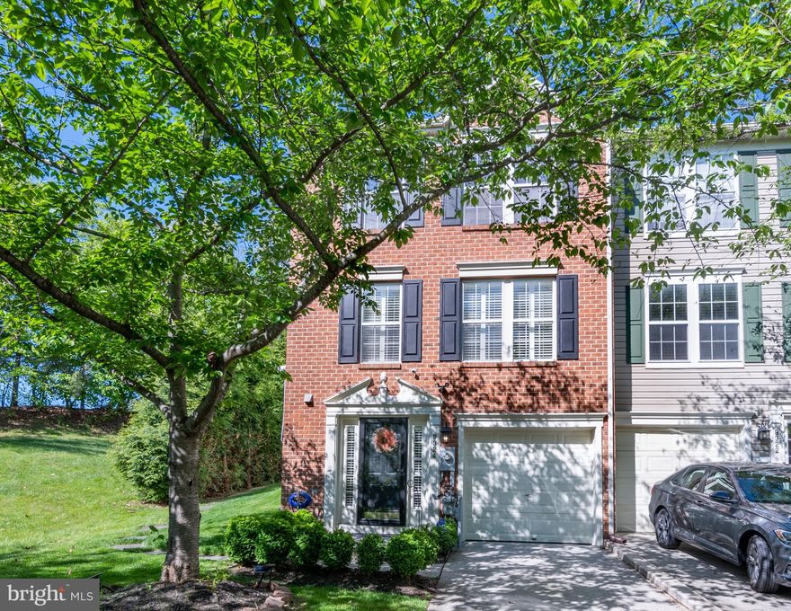 ******Offer Deadline: please submit your best and final offer by 12 noon on Monday 5/16******

This elegant brick end-unit combines the best of urban and rustic living in one of the most picturesque neighborhoods Howard County Laurel has to offer. The large driveway with garage and plenty of adjacent street parking says, “Welcome Home!” The entry level greets you with a lovely family room and additional bump out that can be used as an office or 4th bedroom. Wind your way up the stairs to the main level where exquisite natural light enters through oversized windows. The eat in kitchen features a charming island with a rugged farmhouse appeal and built in wine storage. Exposed wood shelving and an urban chic overhead pot rack complete this oasis perfect for entertaining, or enjoying a cozy meal home alone. The additional family room off the kitchen boasts exposed beams and a built in bookcase. The large living room welcomes the morning sun and completes the main level. The third floor holds three bedrooms. The primary bedroom showcases cathedral ceilings, 2 walk-in closets with additional shelving and storage, ceiling fan, and full en suite bathroom including a soaking tub and separate shower. 2 additional bedrooms, 1 with a built in murphy bed, and a 2nd full bath complete the third story. The private backyard, enclosed by well-established spruce trees, creates a space of tranquility and peace. The backyard backs to additional trees, includes a wooden deck with built-in bench and additional patio. Community includes a library and recreation areas. Convenient to Routes 95 and 32  and the MARC train station.