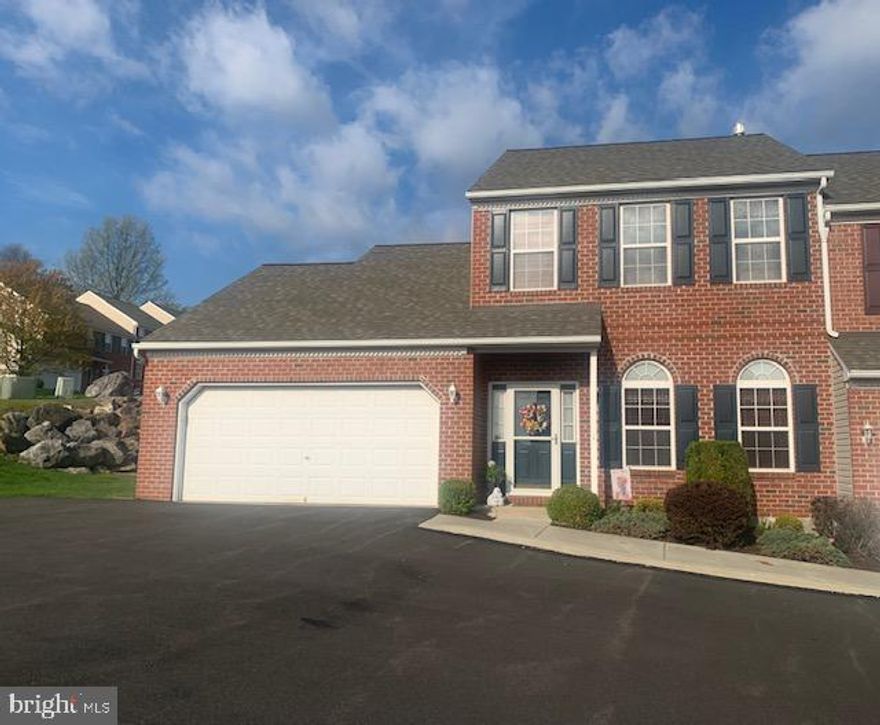 Bright and spacious Greth-built townhome in Thomas Gardens. This home has some hard-to-find features, including exceptional closet space, a first floor primary bedroom suite,  a 2-car garage, and lots of parking in the front of the property. The HOA takes care of lawn care and snow removal and the monthly fee is $206.15.  The home is in very nice condition, neutral colors, and is move-in ready. The living room features a tile entry and a corner gas fireplace. The 23-handle maple kitchen has lots of storage, a breakfast bar, flat-top range, two pantry closets, tile backsplash, and a tile floor. The spacious dining area has a tile floor, and a slider to the rear patio. The convenient 1st floor primary bedroom with double entry doors provides a walk-in closet, and a full private bathroom. The large laundry room includes a wash sink. On the second floor are two large bedrooms, each with a walk-in closet and a ceiling fan. There's a hallway bath and a linen closet. The oversized 2-car garage has an access hatch for potential storage above, and an automatic opener. The Thomas Garden community is peaceful and pleasant, with a play area and a picnic pavilion, curved streets, and easy parking for residents and visitors.  Also, it is close to shopping and access to major highways.