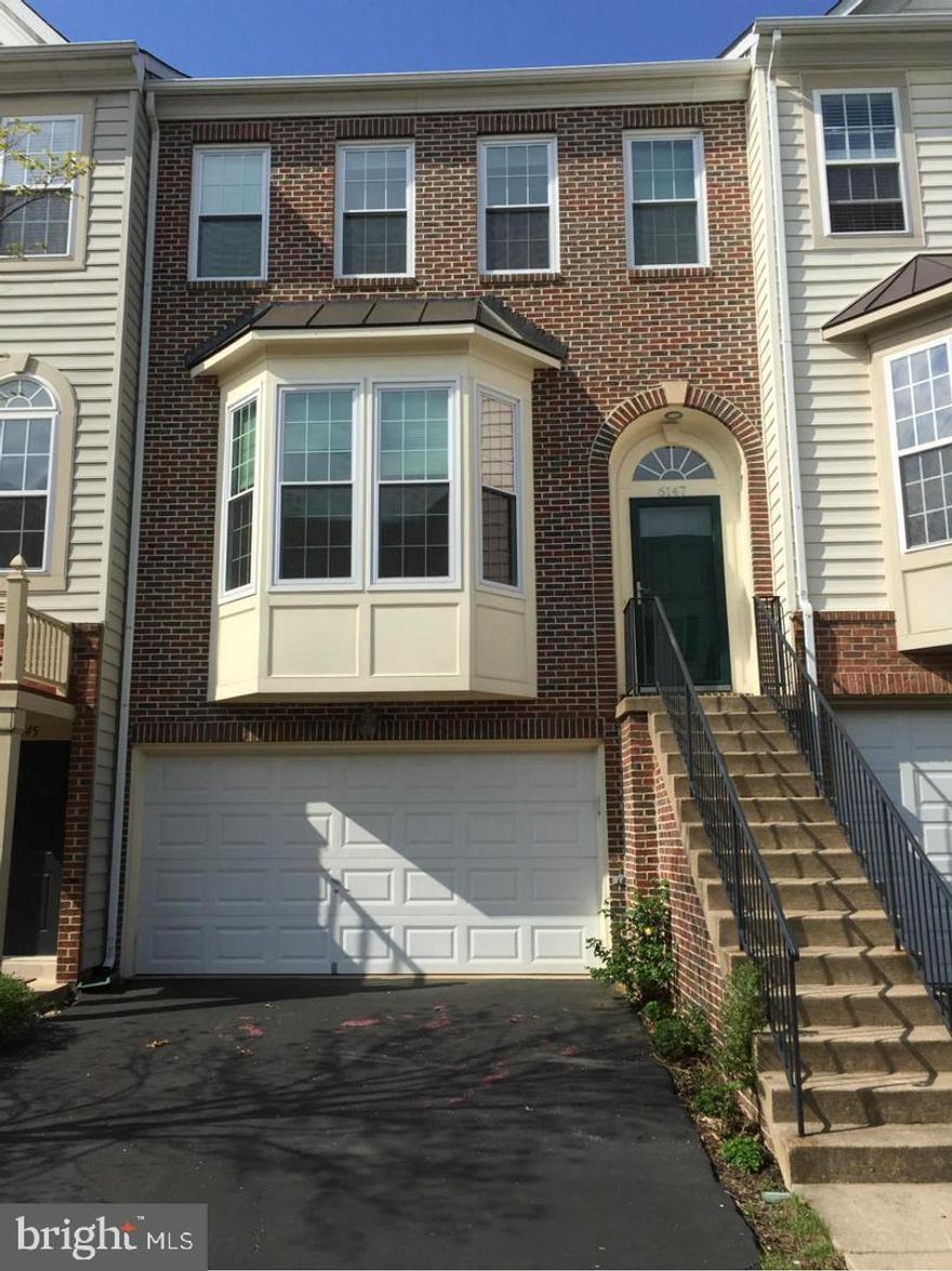 Beautiful Brick Front Townhome with 2 car garage.  3 level bumpout for added living space.  Large kitchen with plenty of counter space and breakfast bar.  Gorgeous 2 sided fireplace shared by family room and dining room.  Living room with Bay window. Spacious Master Suites with try ceiling, walk-in closet, sitting room & luxury bath.  Finished lower level walk out to patio, fenced yard and storage . Sorry No Pet.