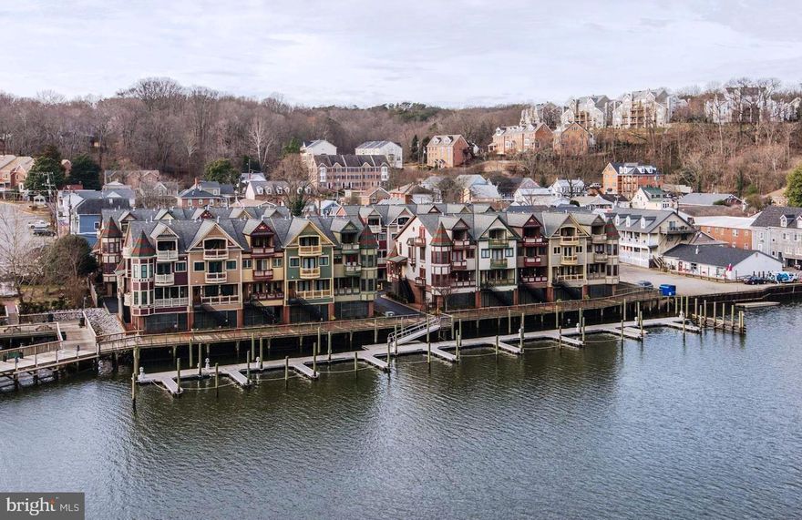 entered for comp purposed * Sale by Owner* Unique - Luxury Riverfront Home in Historic Occoquan with Deeded Boat Slip,  Full Service Elevator to all 4 levels,  End Unit with multiple decks/ balconies, Gourmet Kitchen with stainless/ granite/ built-in upgrades,  4th Level, Bonus Room / 4th Bedroom,  Gym and bath,