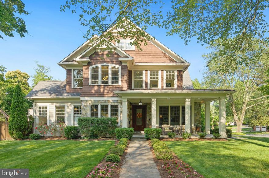 Picture Perfect & Move In Ready!  Welcome to 6305 Landon Lane, a stunning craftsman offering six bedrooms, five and a half baths, and over 6,700 square feet of luxurious living space. Situated on a cherry tree and dogwood-lined street, this home welcomes you with a charming stone porch and a gorgeous custom eight-foot-tall mahogany front door. Step inside to find hardwood floors throughout, 10-foot ceilings, and elegant archways. A formal living room features a gas fireplace, floor-to-ceiling windows, and dual doorways leading to a spacious and bright dining room with a tray ceiling and wall paneling. Next to the dining room is a conveniently located wet bar.

The family room features a beautiful wood burning stone fireplace, coffered ceiling, and double French doors opening to the immaculately landscaped backyard. The family room flows perfectly to the spectacular chef’s kitchen, featuring a 48” Wolf range, dual wall ovens, Sub-Zero refrigerator, a built-in coffee brewing system, a wine fridge, and a large, sun-filled breakfast area. Off the kitchen is a large mudroom, walk-in pantry, and access to the two-car garage with abundant storage. The main level is completed by a large home office and powder room.

A gracious  floating staircase leads to a welcoming second-floor landing. This level offers four bedrooms and three full bathrooms. The luxurious  primary suite features  a tray ceiling, dual walk-in closets with custom Elfa closets, and an ensuite bath which features Carrara tile, dual vanities, a separate makeup vanity, soaking tub, large shower, and water closet. A second bedroom with an ensuite bath, a third and fourth bedroom with a Jack & Jill bath, and a conveniently located upstairs laundry room complete this level. An amazing bonus: all bedroom closets already have built-in storage systems! Step upstairs to the large third floor loft, plus a fifth bedroom and full bathroom - the perfect space for guests or kids alike.

The lower level features a large storage room (with no room wasted on water heaters - a tankless system is in place!), a gym with brand new flooring, recreation room with bar and electric fireplace, and a theatre room with integrated projection and audio system. A sixth bedroom and additional full bath complete this level. 

Step outside to a gorgeous stone patio with fireplace, situated alongside a large, flat lawn (with irrigation system) - perfect for entertaining guests while the kids run around. The two-car garage and custom-designed concrete paver driveway are to the side of the house, taking advantage of the corner lot for a more elegant front entrance.

An integrated sound system services the entire first floor plus the primary suite, with connection ports on the main, upper, and lower levels. A central vacuum, hardwired ethernet, home alarm system, and external video cameras are the cherries on top for this perfect home.

Situated on a corner lot in desirable Oakwood Knolls, 6305 Landon Lane is a five-minute walk to Thomas W. Pyle Middle School and Walt Whitman High School, as well as Landon School. Don’t miss this immaculate home with luxury upgrades at every turn. A truly must see home and is a perfect 10!