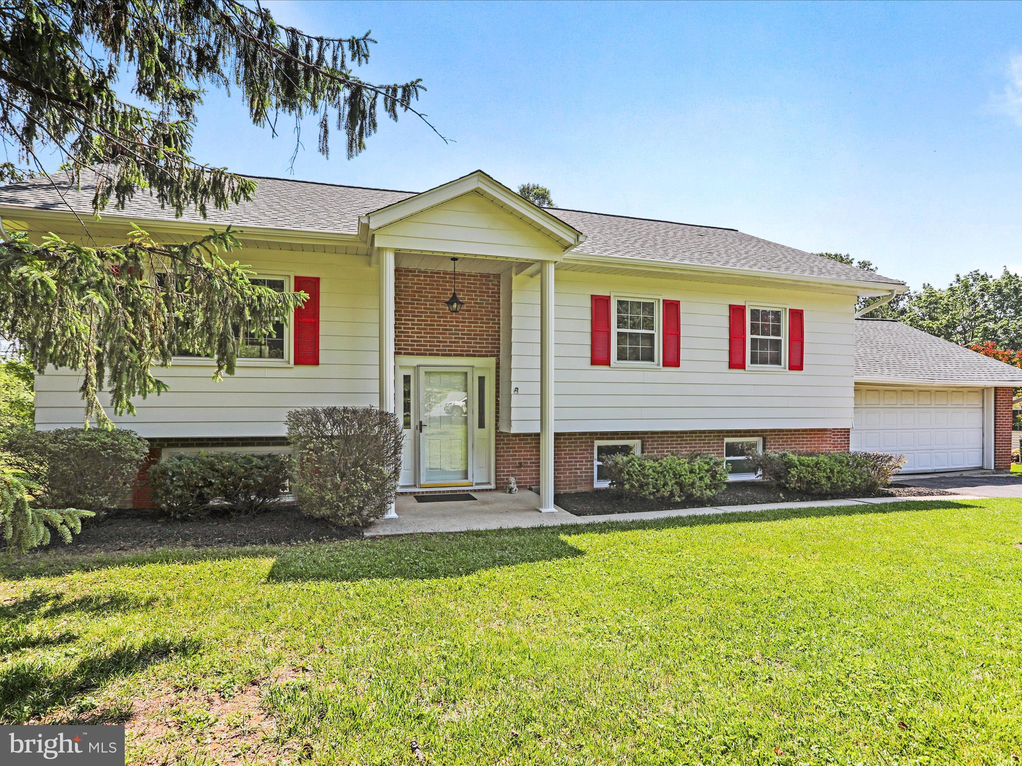This beautifully updated split foyer home, built in 1975, offers a perfect blend of comfort and functionality. With over 2,500 sq. ft. of thoughtfully designed space, it features three bedrooms (with additional “flex” room in the basement) and three renovated full bathrooms, including a luxurious primary bath with a walk-in shower. This home is packed with updates including a newer septic system + field (2015), roof (2020), HVAC system (2015) refinished floors and brand-new paint throughout (2025). The exterior of the home and sunroom were recently painted and show a pride of ownership. Fixtures, ceiling fans and many other upgrades make this home move in ready. The inviting living area boasts hardwood floors and an open layout, perfect for entertaining. The newly finished basement (2024), complete with a walkout level and daylight windows, provides additional living space or a cozy retreat. Enjoy the convenience of modern appliances, including a dishwasher, electric oven, and a pellet stove for those chilly evenings. Step outside to a serene 0.88-acre lot, perfect for outdoor activities, and relax on the screened porch. The attached two-car garage and ample driveway parking add to the home's appeal. With exterior lighting enhancing the charm, this residence is ready to welcome you home. Minutes from Interstate I-70 and close to downtown Frederick, Middletown and more….this home has it all!