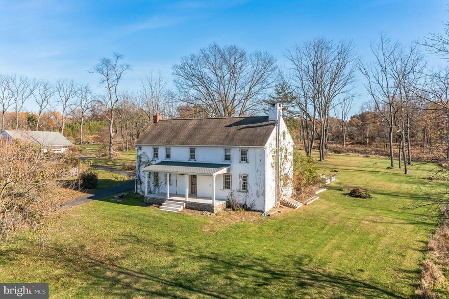 Watch the sunset from  the front porch and see why this beautiful home is called Westview. Originally built in the 1740s, this pre-revolutionary home sits on 17.69 idyllic acres in the sought after Methacton School District. Conveniently located to Montgomery Community College, the Blue Bell Country Club, Merck, and all the shopping and amenities around Lansdale, this unique property allows for endless opportunity. The 4 bedroom, 3 full bathroom home has an updated kitchen and primary bath alongside the original wide plank flooring, built ins, and oversized home hearth (with two other fireplaces as well). A detached oversized garage with tall ceilings and second floor storage provides ample space for tools, toys, or a collection of cars. Customize the existing home to make it your own, build your dream home from scratch, or potentially subdivide the property into additional lots - there are countless ways to unlock the additional potential of this country estate. The current owners bought the property intending to fully restore it as their family home, but as life has taken them in another direction and to another location, the opportunity to finish this amazing project can be yours. Don’t miss your chance to tour Westview today!