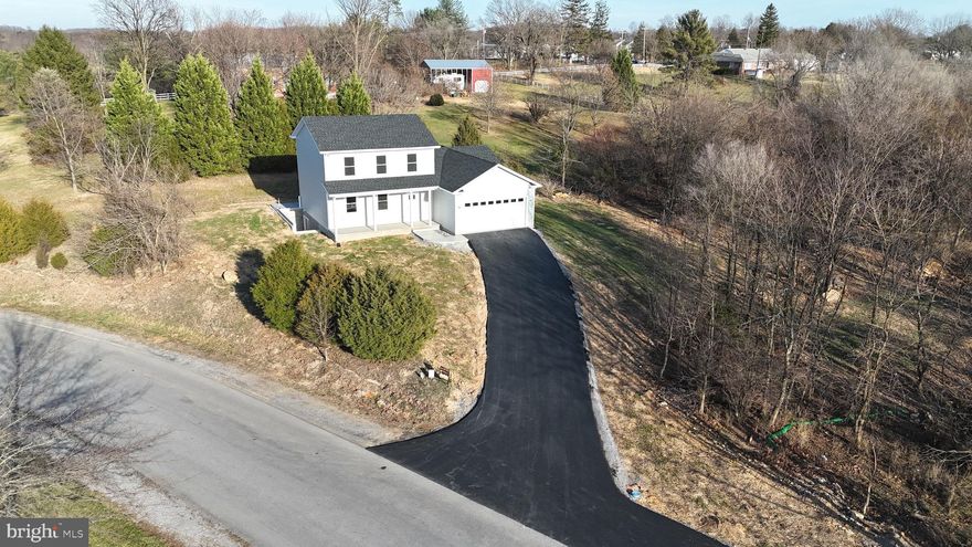 This new home is in a golf course community that has a restaurant, 9 holes of golf currently available, and  golf practice facility. The 4 bed 2.5 bathroom home offers 2,000 sqft of finished space above grade on a full walk up basement. Step into your open concept kitchen/dining/living room with oversized island with Quartz countertops great for entertaining and hidden added storage. The kitchen has stainless steel appliances and upgraded cabinets. 9' ceilings throughout the home. The master bedroom is on the main living level with a large walk in closet and custom walk in shower in the bathroom, there is also a dual vanity for his and her bathroom space needs. The second level of this home offers 3 more spacious bedrooms with individual walk in closets. The upstairs bathroom offers a large vanity and soaking tub. This home has a dual zone heating and cooling feature that offers upstairs and downstairs climate control options. The basement has plenty of room for storage, man cave, she shed, kids kingdom all the options and possibilities, there is a rough in for an additional bathroom in the basement as well and your water heater and water line connections for easy access to utilities.  Convenient to town and everything Martinsburg WV has to offer is just minutes away.


New Construction* Should have U&O permit in a couple weeks.