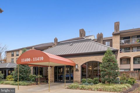 Photo of 11400 Strand Drive #R-402, ROCKVILLE, MD 20852 (MLS # MDMC2220166)