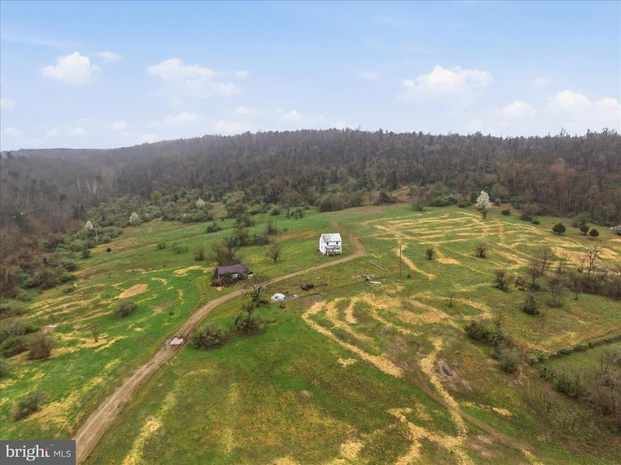 A truly rare opportunity to own over 150 acres , just a few miles west of the scenic Shenandoah Valley—where rolling pasture, privacy, and possibility come together.

950 Stony Hill Rd. offers a stunning blend of open farmland and natural beauty. With significant portions of the land farmable, this property is perfectly suited for agricultural use, equestrian pursuits, or creating a remarkable private estate or multi-generational retreat.  Development may be possible.  Any Purchaser needs to do their own research for their desired use(s).

Existing features include available electric and a former tenant house (not livable).  
This property is 15 minutes from Historic Old Town Winchester, featuring a wide array of shopping, dining and entertainment options.  Year-round outdoor activity pursuits are possible on property or nearby, including, golfing, hiking, fishing, kayaking and even skiing within 2 to 2.5 hours.  

Must be accompanied by Agent and have appointment to tour property.  Livestock on property.  D0 NOT ENTER OLD TENANT HOUSE.  IT'S NOT SAFE.  Private property. No drive-bys.
