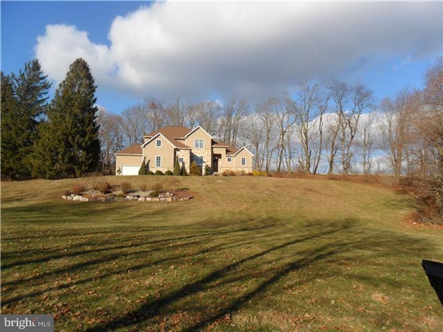 Beautiful custom built 4-5 bedroom home situated on almost 5 acres in the Blue Mountain School District. Spacious 53 handle eat in kitchen w/island, granite countertops, ceramic tile flooring, stainless steel appliances opens to Great Room w/hardwood floor, vaulted ceiling and floor to ceiling stone fireplace. Master Bath offers double-bowl sink and vanity as well as a huge tile walk in shower. The lower level includes an exercise room, storage, full bath and rec room (approx. 720 additional square feet) was completed in 2014. Great views and the property also backs up to State Game Lands.