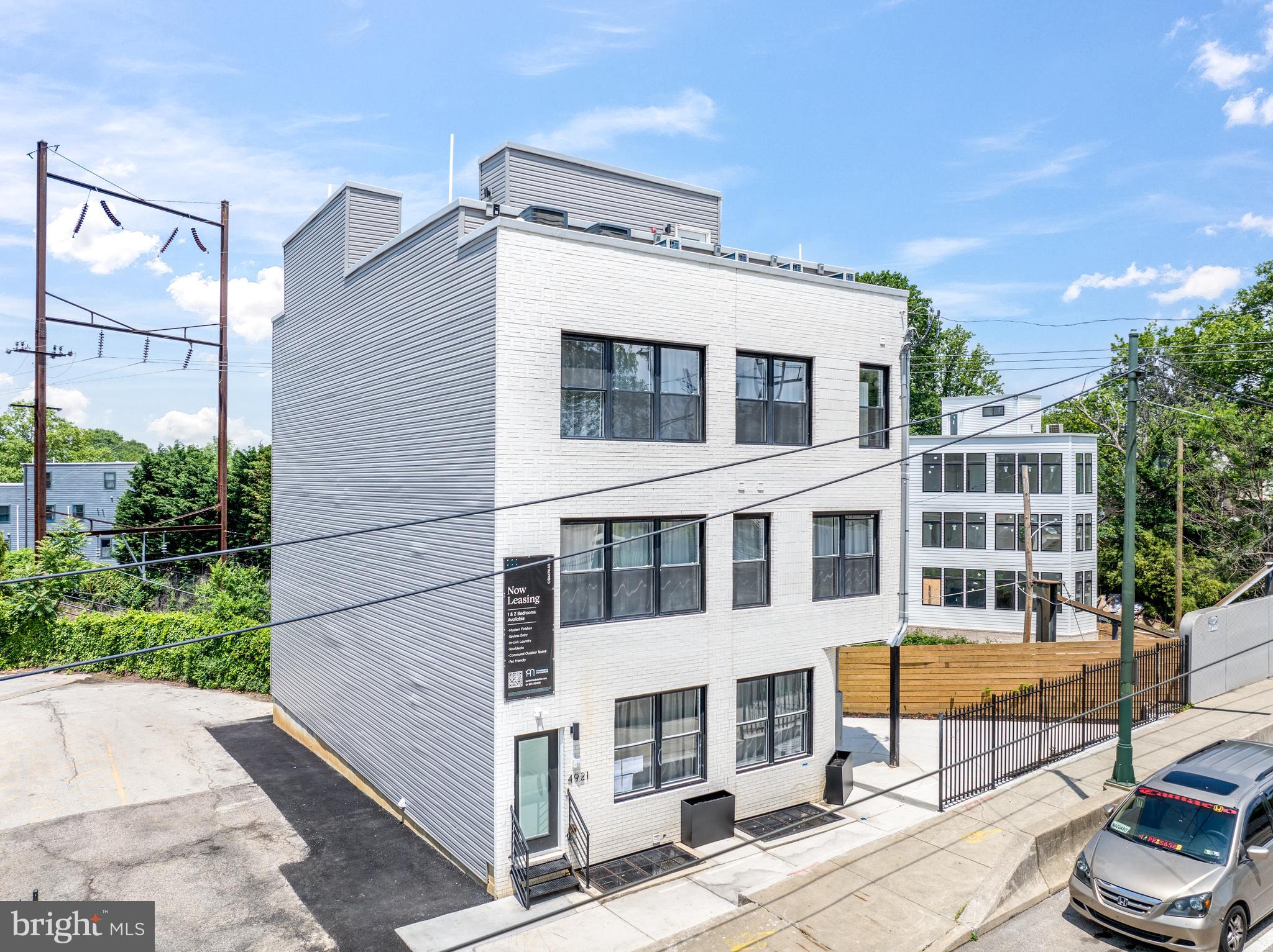 4921 Chester Avenue, a newly constructed six-unit multifamily building located in the rapidly growing Kingsessing neighborhood of West Philadelphia. Delivered in 2025, this property offers a fully stabilized, turnkey investment opportunity with high-quality modern finishes, efficient layouts, and strong in-place cash flow. Situated just steps from SEPTA transit and anchored by major University City employment drivers, this offering is ideal for an investor seeking a low-maintenance asset in an appreciating corridor.Stabilized 6-Unit Asset in West Philadelphia*
• *Delivered New in 2025* – All major systems, finishes, and interiors are brand new
• *Turnkey In-Place Cash Flow* – Over \$10,000/mo in current rental income
• *Desirable Unit Mix* – 1BD, 1BD+Den, 2BD, and Roof Deck units
• *Strong Fundamentals* – 7.04% Pro Forma Cap Rate, \$353/SF basis
• *Transit-Oriented Location* – Steps to 49th St Trolley Station and UPenn facilities