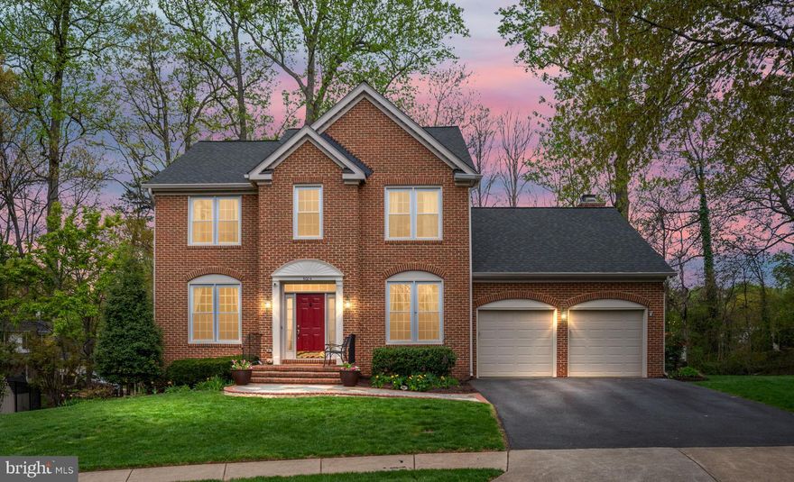 Open House this Saturday & Sunday 12pm-3pm!!! Welcome to your dream sanctuary, a stunning brick front colonial nestled in the heart of Burke, where charm meets elegance in an idyllic cul-de-sac setting. This home is a true gem, surrounded by an established community that radiates warmth and hospitality. As you step inside, you'll be greeted by the inviting glow of hardwood floors that guide you through the main living areas, exuding a sense of timeless sophistication.

Imagine hosting gatherings in your chef's kitchen, a haven for culinary creativity adorned with exquisite quartz countertops, a stylish tile backsplash, and top-of-the-line stainless steel appliances. The heart of this home is the family room that effortlessly flows from the kitchen, featuring a cozy wood-burning fireplace that beckons for laughter and cherished moments with loved ones.

Adjacent to the kitchen, a spacious dining area awaits; it's the perfect spot for elegant dinners and heartfelt celebrations. An additional formal living area adds to the allure, providing a serene space for relaxation or intimate conversations.

Ascend the staircase to discover your private retreat—the expansive primary bedroom, where tranquility reigns. The spa-like en-suite bathroom invites you to unwind in luxury, offering a perfect escape after a long day. Three additional well-appointed bedrooms upstairs ensure that family and guests alike enjoy comfort and privacy, complemented by a beautifully renovated bathroom.

Venture to the lower level, a true entertainer's paradise that promises unforgettable gatherings. Here, the bar area stands ready to host lively celebrations with family and friends, while a dedicated exercise room invites you to maintain your fitness routine in style. An additional den or office space provides flexibility for work or leisure, making this home perfect for modern living.

Step outside to your enchanting backyard, where a sprawling deck overlooks a serene, wooded, fenced oasis—your very own sanctuary for relaxation and rejuvenation. Whether sipping morning coffee or enjoying evening sunsets, this outdoor space is designed for blissful moments of tranquility.

Commuters Dream... enjoy a stress free commute with the Burke VRE & in walking distance to the Fairfax Connector bus stop, restaurants, library & schools!!! Don’t miss the opportunity to make this captivating residence your own—it’s truly one of a kind and won’t last long on the market. Your new beginning awaits!