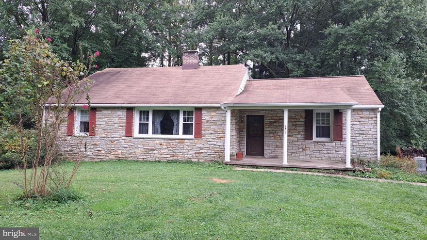 Rare find - 1.6 acres in Perry Hall.  3 bed/2 bath stone front rancher sits on  1 acre + commercial building sits on the remaining .6 acre.  Solidly built home with plaster walls and iron enforced block walls. Has wood burning fireplace in living room, state foyer & original hardwood floors throughout main level.  Being sold AS IS.  Seller will not make any repairs.  Update/remodel to suit your personal taste  to create the home of your dreams.  City water and septic.  No HOA. Cash offers only.