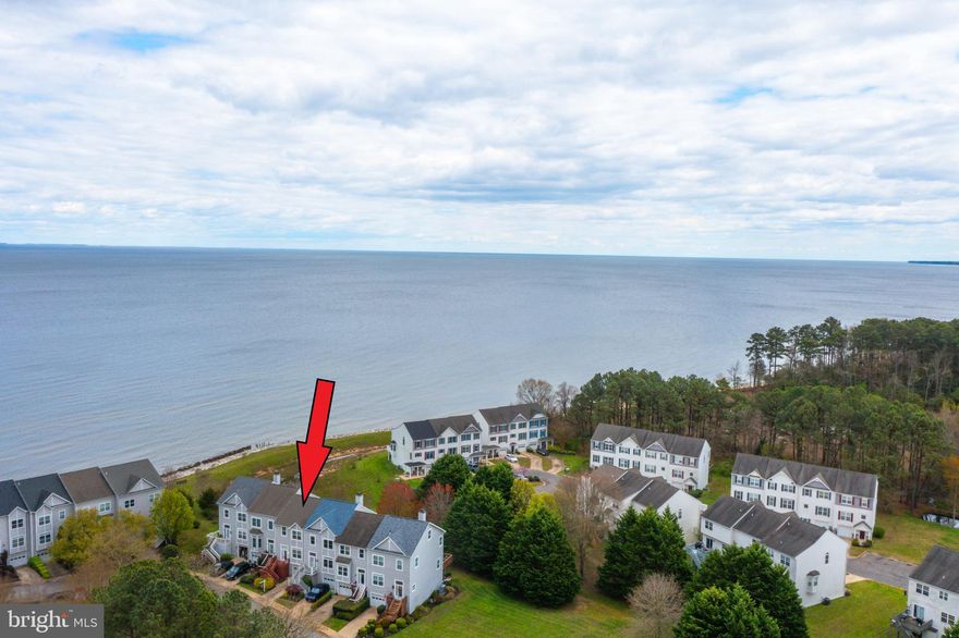THE BEAUTIFUL VIEW OF THE CHESAPEAKE BAY IS THE BEST-KEPT SECRET OF THIS WONDERFUL COMMUNITY.  THE LIST PRICE REPRESENTS THE OPENING OFFER AMOUNT. The townhouse in the Villas on Waters Edge community offers a great living experience with its spacious layout and convenient features. This could be your new home! You’re welcome.  This is a charming townhouse nestled in a sought-after picturesque beach-side community of the Villas on Waters Edge. This move-in ready offers a comfortable and spacious living experience with 3 bedrooms, 2 full bathrooms, and 1 half bathroom. Upon entering, you will be greeted by an abundance of natural light that fills the home. Designed with an open concept, the main level allows for seamless flow between the living areas, perfect for entertaining or simply enjoying day-to-day living. A newer roof, with three finished levels, this townhouse offers ample space for comfortable living, accommodating various needs and preferences. Lower-level finished space is perfect for a home office with a half bath. Main-level kitchen with recently updated appliances and a slider that opens to a spacious deck with a view of the Chesapeake Bay. The upper level has a primary bedroom w/walk in closet and a bathroom w/soaking tub, separate shower, and vanity. There are two additional bedrooms and a full bathroom to complete the upper level. One of the standout features of this property is its incredible proximity to the private beach, just a quick two-minute walk away. Imagine the convenience of strolling down to the peaceful Chesapeake Bay during the warmer months, soaking in its tranquil beauty. Additionally, you will appreciate the convenient location, with shopping, restaurants, and the Patuxent Naval Base close by, ensuring everything you need is easily accessible. A wonderful 2,104 square feet of interior living space adds to the practicality and convenience of this townhouse. Don't miss the opportunity to schedule your showing today.

Offers will be accepted through Monday, April 29, 2024 at 1:00 pm.

AT THE SELLER'S DISCRETION, AN OFFER MAY BE ACCEPTED OR REJECTED AT ANY TIME.