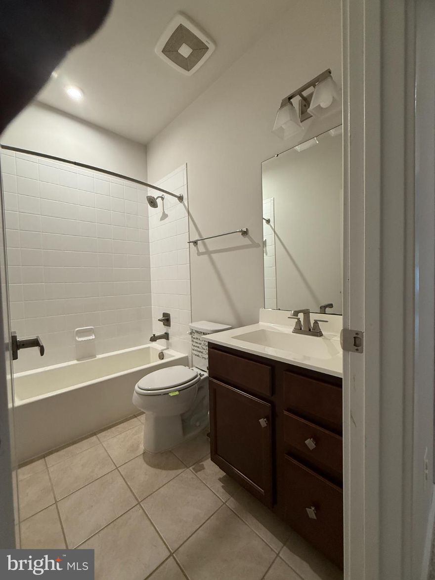 Discover the charm of Greenbelt, where community spirit meets modern living in this beautifully designed traditional townhouse. Built in 2019, this interior row home offers 1,280 square feet of versatile space, perfect for creating your dream sanctuary. Nestled in a vibrant neighborhood, you'll find yourself just a stone's throw away from essential amenities. With a metro/subway station and bus stop less than a mile away, commuting is a breeze, making it easy to explore all that the area has to offer. Greenbelt is renowned for its welcoming atmosphere and strong sense of community. Enjoy leisurely strolls through nearby parks, where lush greenery and playgrounds invite relaxation and recreation. The neighborhood is also home to excellent schools, ensuring that education is always within reach. Engage with friendly neighbors at local events or take advantage of the nearby shopping and dining options that cater to every taste. The blend of convenience and community makes this location truly special. This townhouse is not just a home; it's a lifestyle. With its modern construction and thoughtful design, it's ready for you to add your personal touch. Embrace the opportunity to be part of a thriving community that values connection, convenience, and comfort. Don't miss your chance to make this delightful property your own!