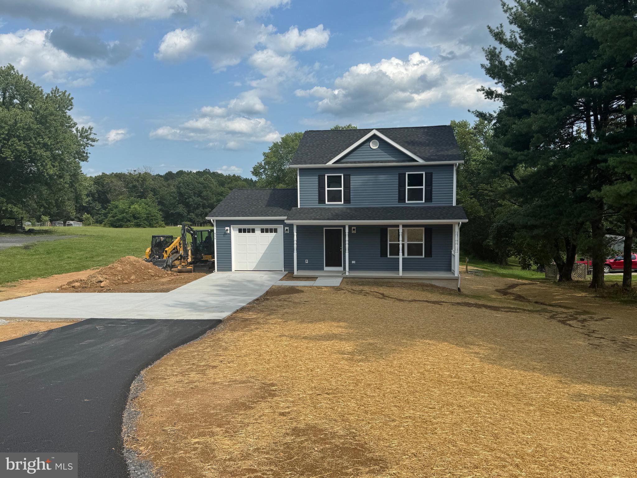 Brand-New Two-Story Home sitting on large 1.27-acre lot only minutes from Winchester! Three bedrooms, two and a half baths. Large kitchen loaded with cabinetry, solid surface countertops and Stainless-Steel Appliances! Primary bedroom with private bath and two closets. Large dining area. Main floor Laundry Room off garage. LVP Flooring throughout the main level. Unfinished Walk Out basement with plumbing rough in for future expansion and Storage. Covered Front Porch and OVERSIZED one car garage with solid surface driveway. Large Barn needs considerable work but has amazing potential. Great Commuter Location East of Winchester off Route 7! Home is complete and ready for its new owner!