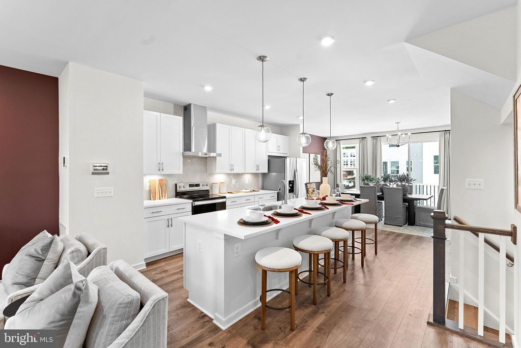 Photo of 43793 Mystic Maroon Terrace #1, ASHBURN, VA 20147 (MLS # VALO2109342)