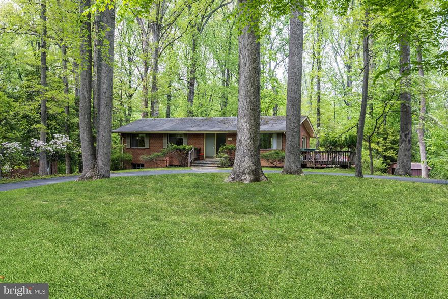 MAJOR PRICE ADJUSTMENT!!!  SELLERS ARE MOVING ...YOUR OPPORTUNITY TO RENOVATE OR BUILD ON A GLORIOUS .84 PRIVATE, WOODED ACRE ON THE  "STREET OF DREAM HOMES"!!!  EXISTING HOME WAS LOVING BUILT BY SELLERS IN 1957...PUBLIC WATER AND  SEWER  AVAILABLE.  CALL FOR EASY APPOINTMENT