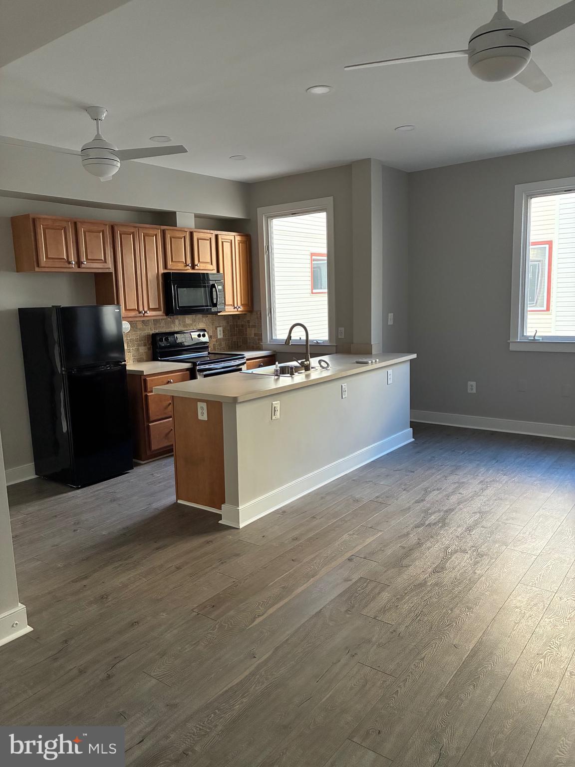 Amazingly priced two bedroom two bath, contemporary design condo. The sunlit open floor plan welcomes you home. The condo offers luxury vinyl tile floors and washer and dryer. The secure building also has an elevator and parking lot.