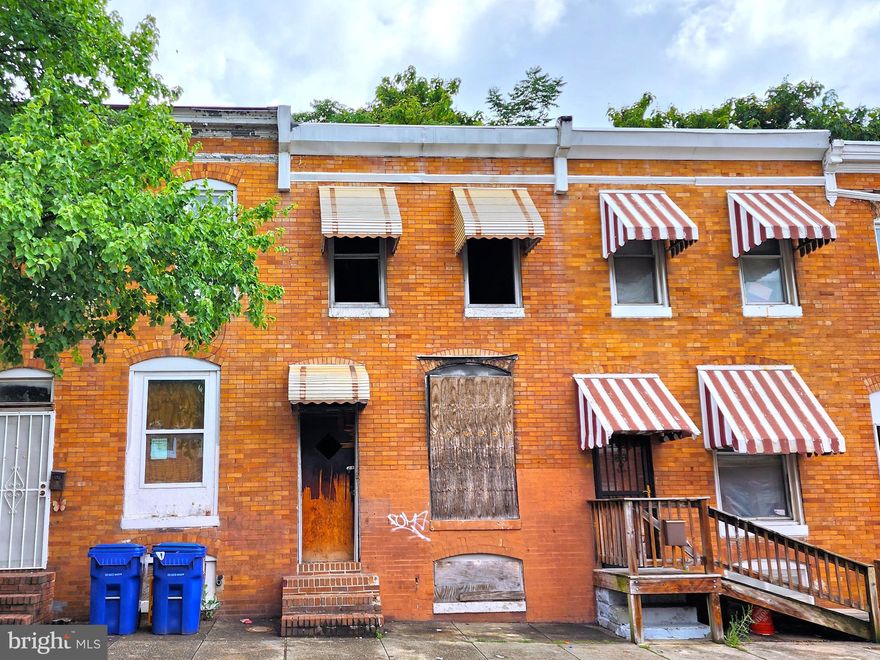 ONLINE AUCTION: Bidding begins 9/5 @ 10:00 AM. Bidding ends 9/7 @ 12:10 PM. List Price is Suggested Opening Bid. This 2-story shell townhouse is situated in the Carrollton Ridge neighborhood of Baltimore, Maryland. Residents have easy access to nearby attractions like the Westside Shopping Center and Mount Clare Junction Shopping Center. Enjoy outdoor activities and events at Carroll Park and Carroll Park Golf Course. Additionally, Grace Medical Center is within close proximity, providing healthcare options. Property is in need of repairs and renovations.  Deposit: $5,000.
