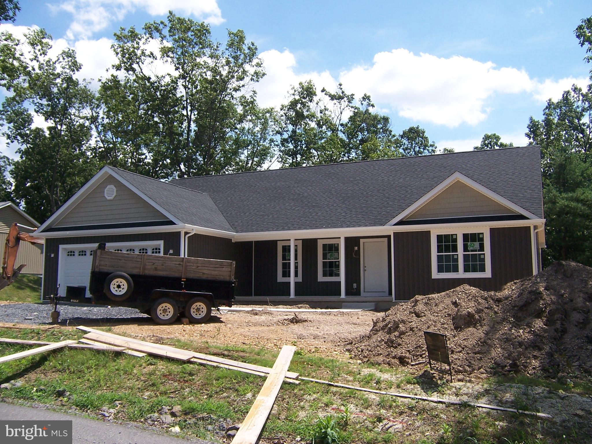 NEW LARGE RAISED RANCHER 1788 SQ FOOT WITH FULL BASEMENT ROUGH IN BATH ON TREEED LOT OFF FAIRVIEW DRIVE LESS THAN 4 MILES FROM ROUTE 70 IN MD LESS THAN 20 MILES FROM HARGERSTOWN MD. IN SECULDED TREEED RURAL AREA 1 WAY IN AND 1 WAY OUT CUL-DE-SAC. NEW HOME BUYER WILL BE ABLE TO CHOSE SOME PICKS IF YOU MOVE FAST. OPEN GREAT ROOM WITH CATHEDRAL CEILING RECESSED LIGHTING. KITCHEN WITH OVER SIZE ISLAND -GRANITE COUNTER TOPS MANY UPGRADES A FLOOR PLAN YOU HAVE TO VIEW. THIS HOME HAS ROOM TO LIVE ON 1 FLOOR AND HUGE BASEMENT FOR FUTURE USE ,BUYER PICKS FLOORING OUT OF BUILDER INVENTORY VINYL PLANK-CARPET-VINYL YOU CHOOSE WITHIN BUDGET-MASTER WITH HIS AND HERS WALK IN CLOSET SOAKING TUB SHOWER .TWIN ,VANTIES SINKS ,FULL BATH,ON EAST END HOME OTHER TWO BEDROOM ON WEST SIDE WITH MAIN BATH FOR PRIVATIVE FULL BASEMENT ROUGH IN BATH- BUYER TO PAY TRANSFER STAMPS- HAVE A NEW HOME BUILT BEFORE SCHOOL STARTS.